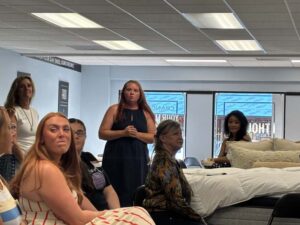 females standing and sitting