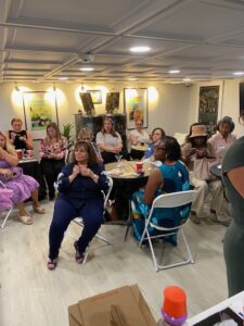 group of women sitting around tables