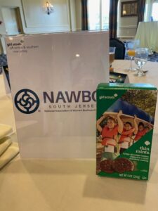 box of cookies and nawbo sign