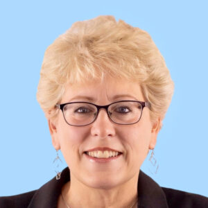 female with short blond hair and glasses